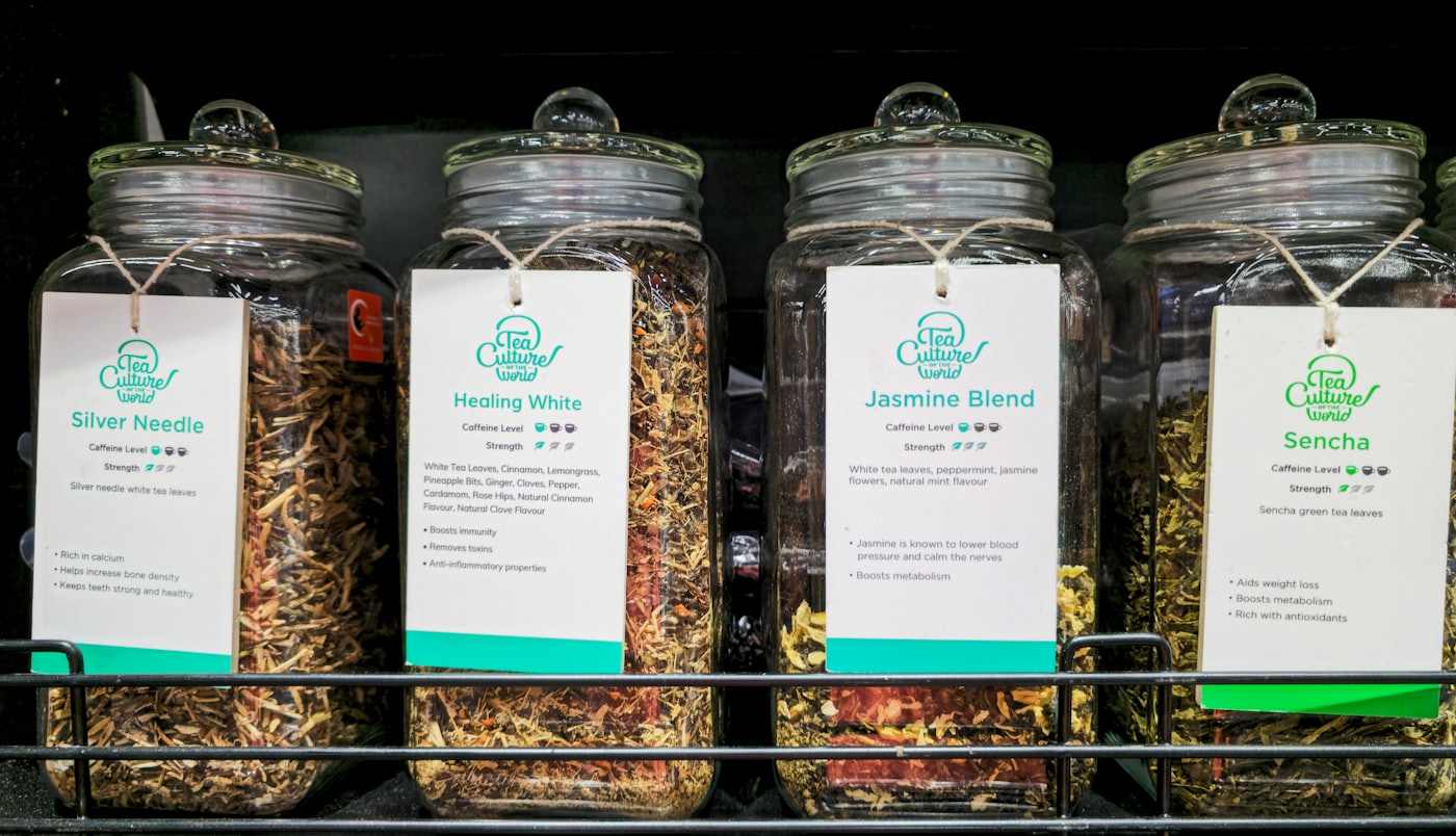 Glass jars filled with dried herbs